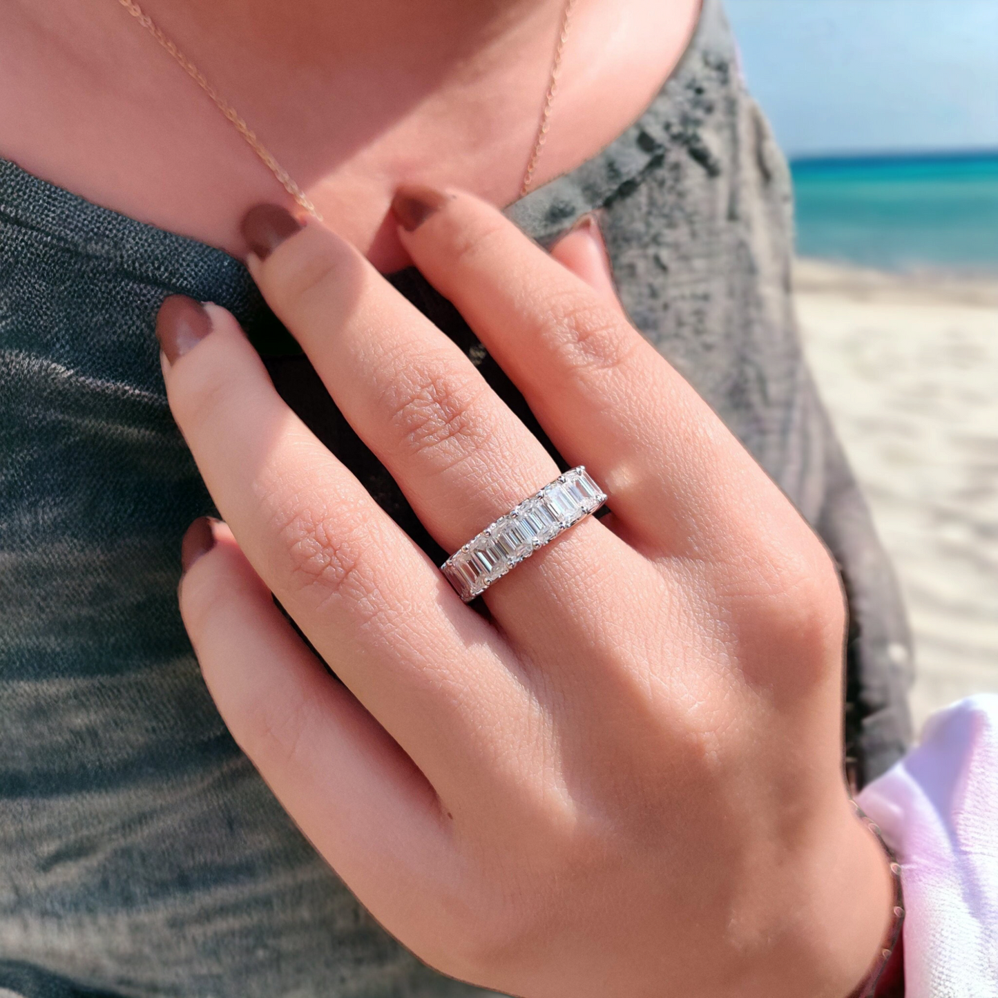 Emerald Cut Moissanite Eternity Ring with Unique Trellis Prong Setting