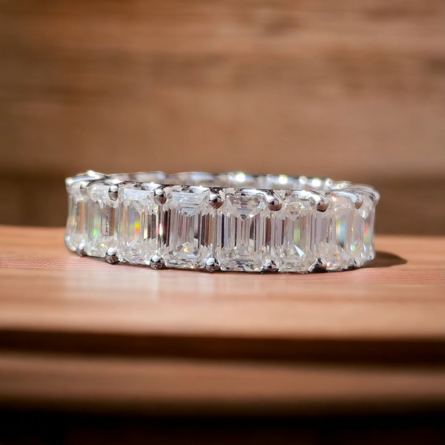 Emerald Cut Moissanite Eternity Ring with Unique Trellis Prong Setting