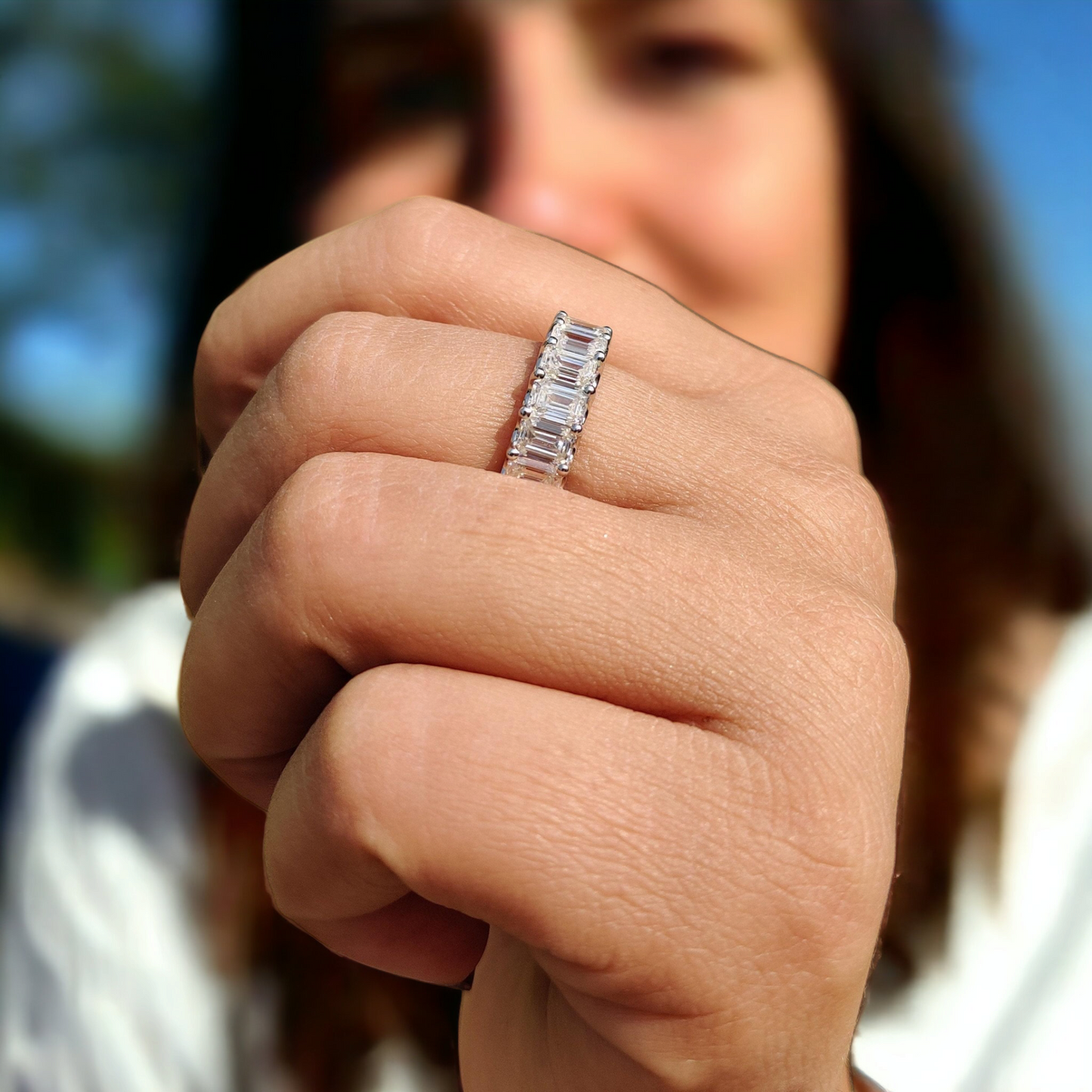 Emerald Cut Moissanite Eternity Ring with Unique Trellis Prong Setting