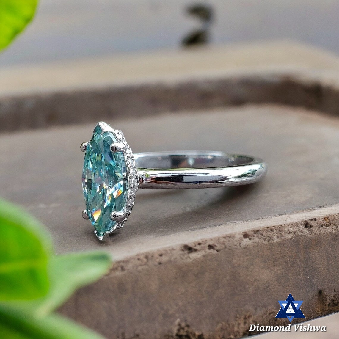 Center Stone Details: - Shape: Marquise Cut - Size: 1.16 CT - Color: Cyan Blue  - Clarity: VVS1 - Measurement: 10 * 5 MM - Luster: Excellent - Make: High Quality