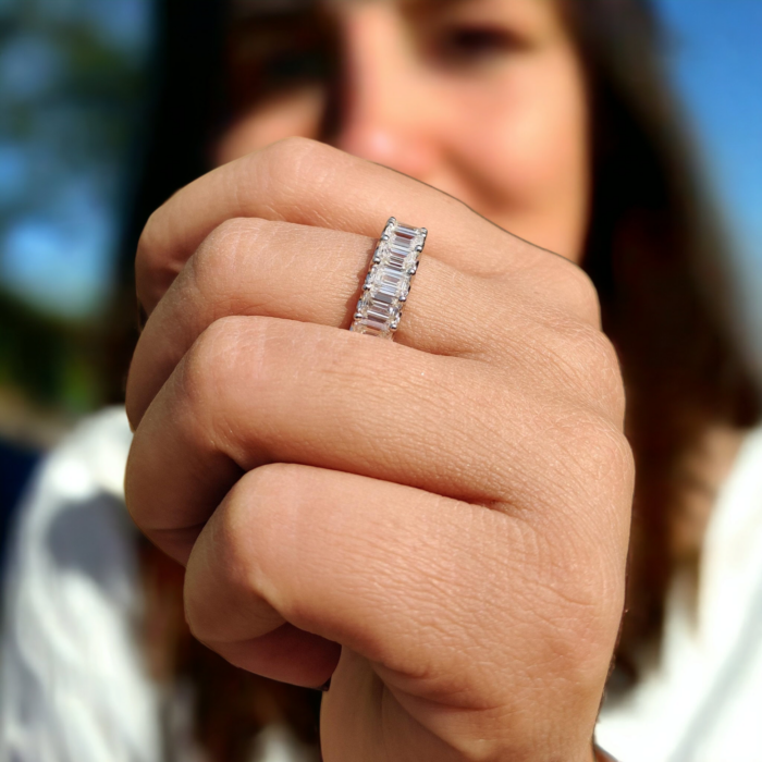 Emerald Cut Moissanite Eternity Ring with Unique Trellis Prong Setting - Image 7