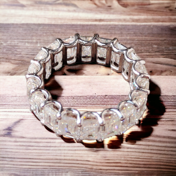 Emerald Cut Moissanite Eternity Ring with Unique Trellis Prong Setting - Image 4