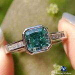 Bezel Set Cushion Cut Cyan Blue Moissanite Engagement Ring - Channel Set Pave Band