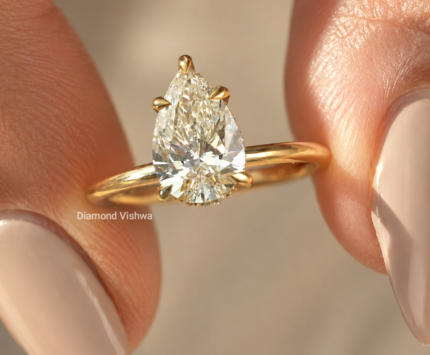 1.5 ct pear cut lab-grown diamond hidden halo solitaire in 14K yellow gold