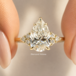 2.5 CT Pear Cut Lab Grown Diamond Side-Stone Engagement Ring in 14K Yellow Gold