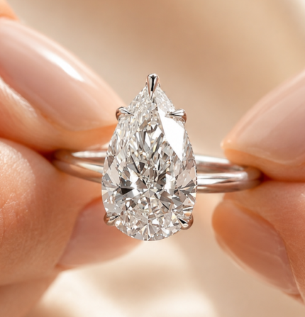 4 ct pear cut lab-grown diamond hidden halo engagement ring, front view