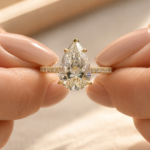 3.5 CT Pear Cut Lab Grown Diamond Hidden Halo Pavé Engagement Ring in 14K Yellow Gold