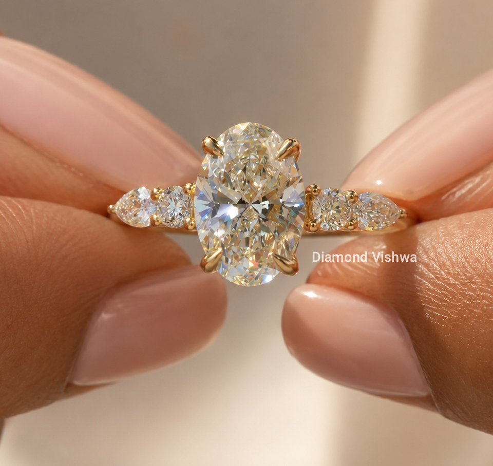 IMG_20260511_204609 Oval Lab Grown Diamond Five Stone Ring, Pear Side Stones, 2 CT, IGI Certified - Image 1