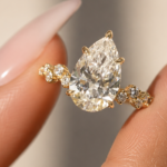 Top view of 2.5 CT pear lab-grown diamond floral hidden halo ring