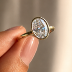 2 CT Oval Lab Grown Diamond Bezel-Set Engagement Ring in 14K Yellow Gold