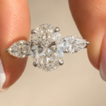 2.5 CT Oval Lab Grown Diamond Three-Stone Ring with Pear Side Stones