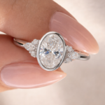 2 CT Oval Lab-Grown Diamond Bezel Engagement Ring with Marquise Side Stones