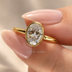 2 CT Oval Lab Grown Diamond Full-Bezel Engagement Ring in 14K Yellow Gold