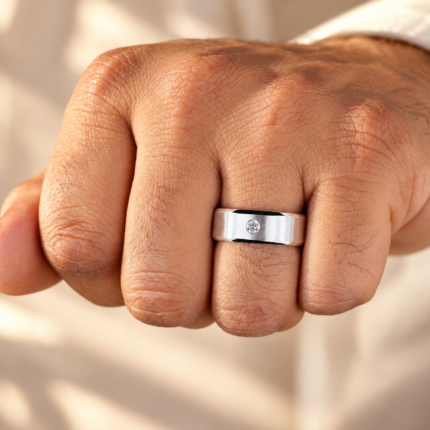 Men's Round Diamond Solitaire with Matte 8 mm Band — worn on a closed hand