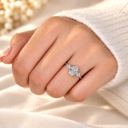 Oval pear trilogy ring, on a relaxed hand