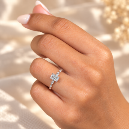 Emerald Cut Lab Diamond Five-Stone Ring with Marquise Accents — worn on a hand