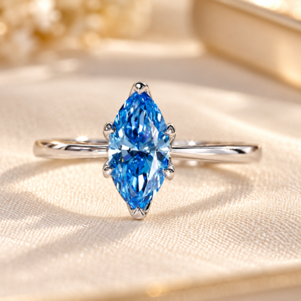 Front studio view of blue marquise lab grown diamond tulip engagement ring