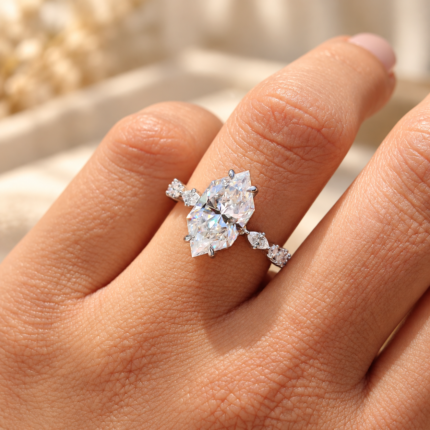 Dutch marquise moissanite hidden halo ring, close view worn on a finger
