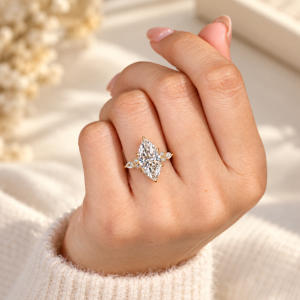 Vintage marquise engagement ring, on a relaxed hand