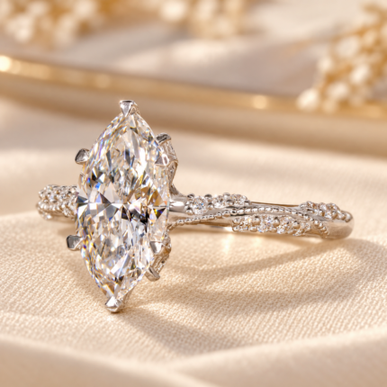 Angled studio view of marquise lab diamond ring and pavé shoulders