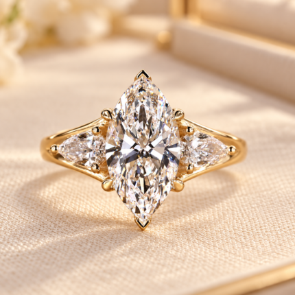 Front studio view of marquise lab grown diamond ring with pear side stones