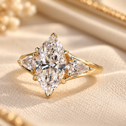 Front close-up of marquise center and pear side diamonds