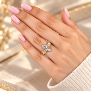 Top hand view of marquise diamond flower and leaf ring