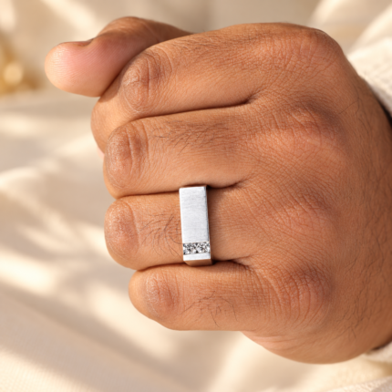 Men's Rectangular Diamond Signet Ring with Brushed Finish — worn on a closed hand