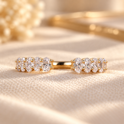 Front studio view of oval diamond half eternity gap band