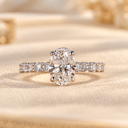 Front studio view of oval lab diamond hidden halo pavé ring