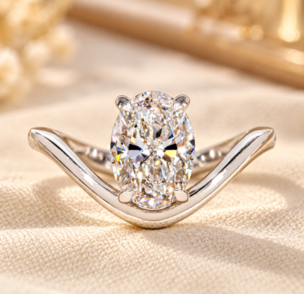 Front studio view of oval lab grown diamond curved solitaire engagement ring