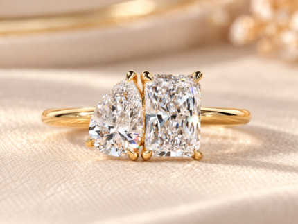 Front studio view of pear and radiant lab grown diamond Toi et Moi ring