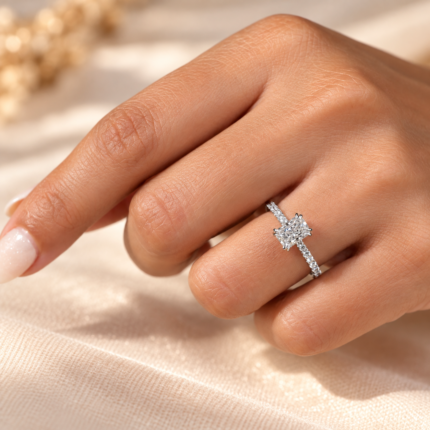 Radiant diamond engagement ring worn on a hand