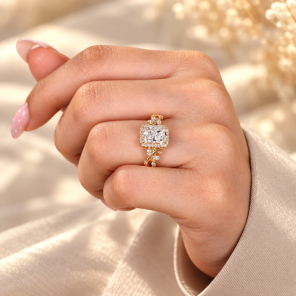 Nature inspired radiant diamond engagement ring worn on a hand
